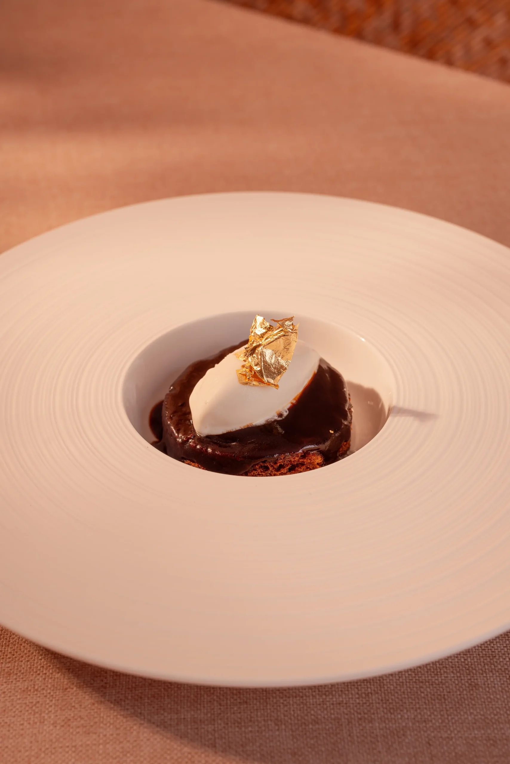 Elegant dessert with dark chocolate and pumpkin